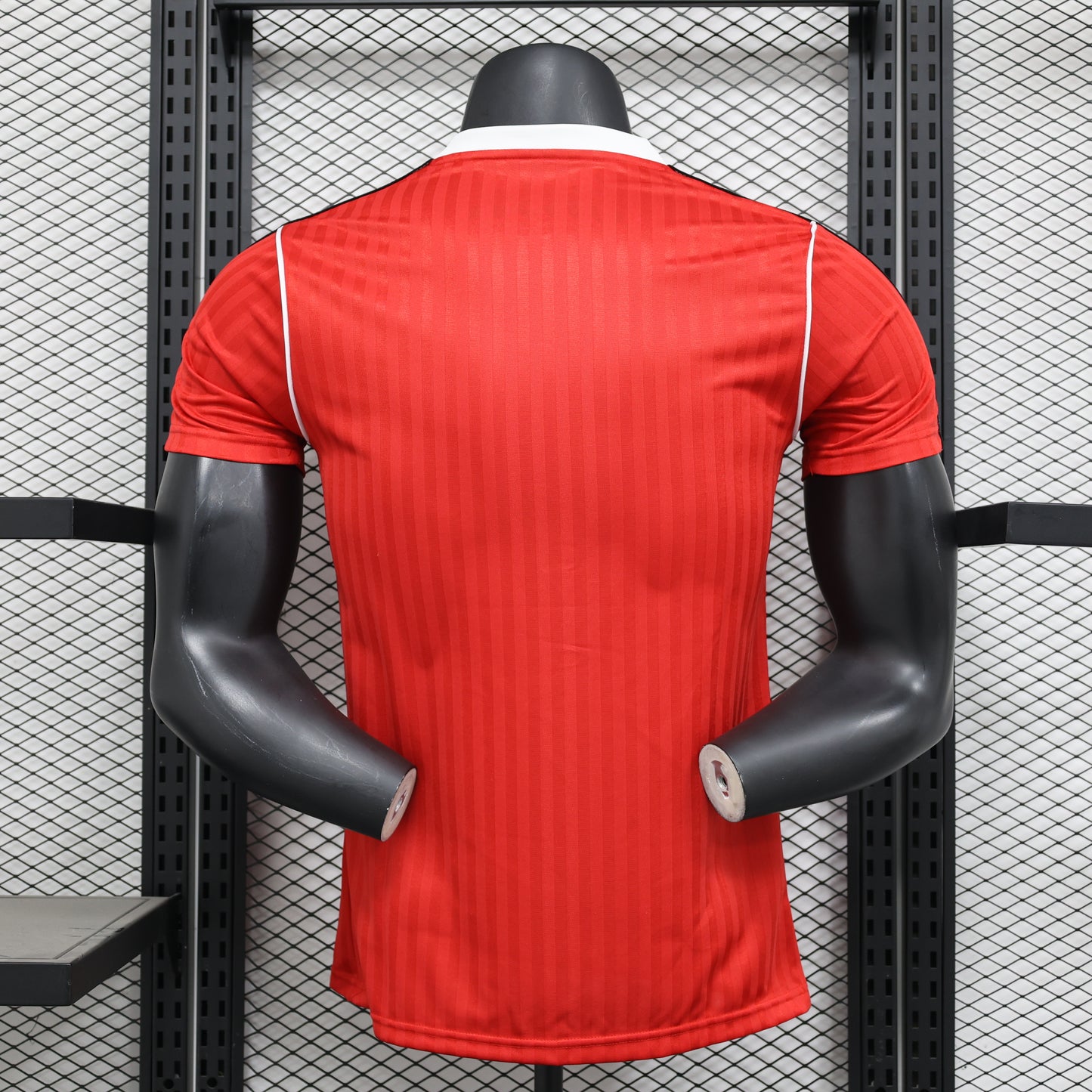 Camiseta del Manchester United con los iconos de la terraza